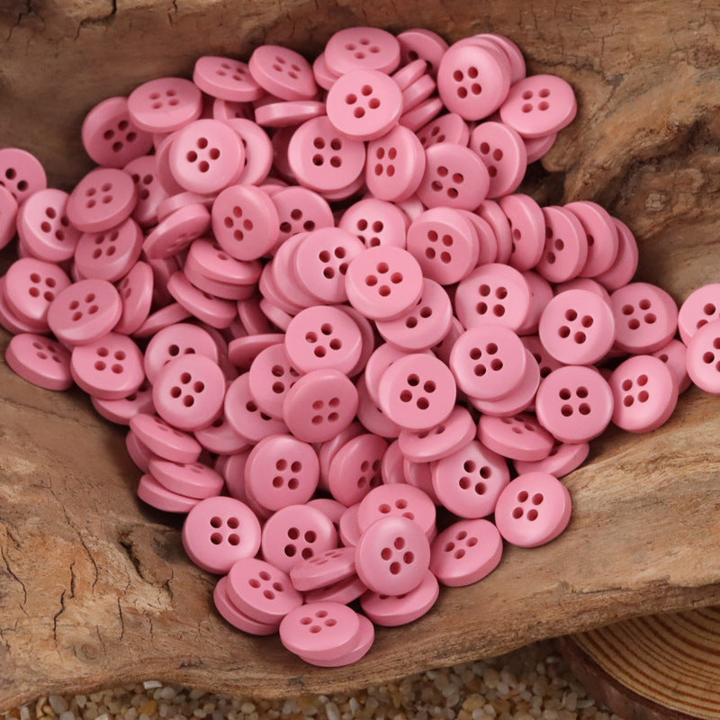 Resin buttons, semi-beveled, pink, 4-hole—children’s dress sweater, 100 pack