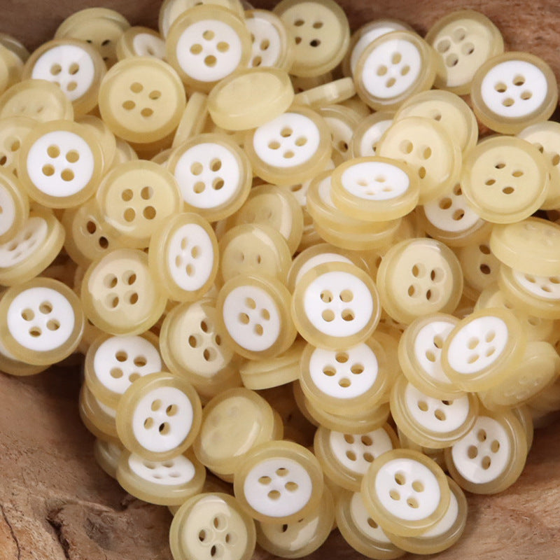 Light yellow/cream resin buttons, 4-hole, 11.5mm bowl-shaped, pile