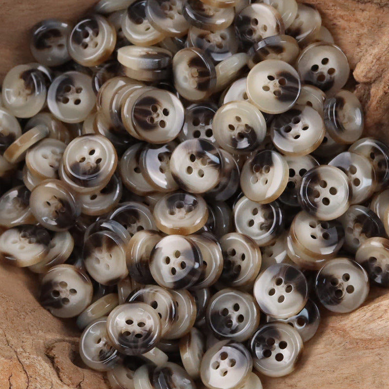 Khaki round resin shirt buttons, four-hole design
