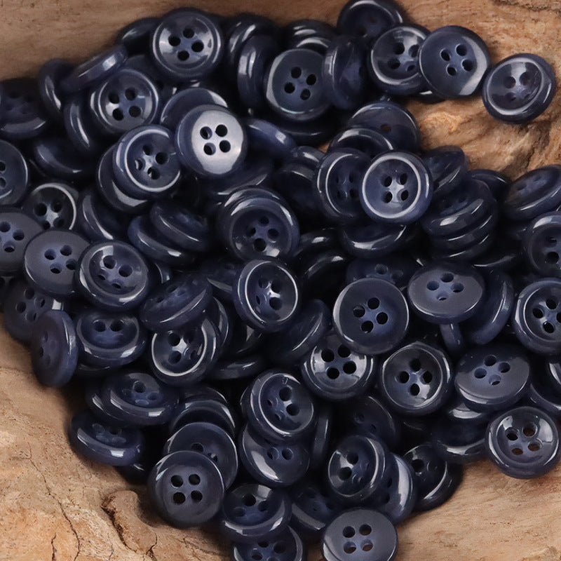 Deep blue round resin shirt buttons with four holes