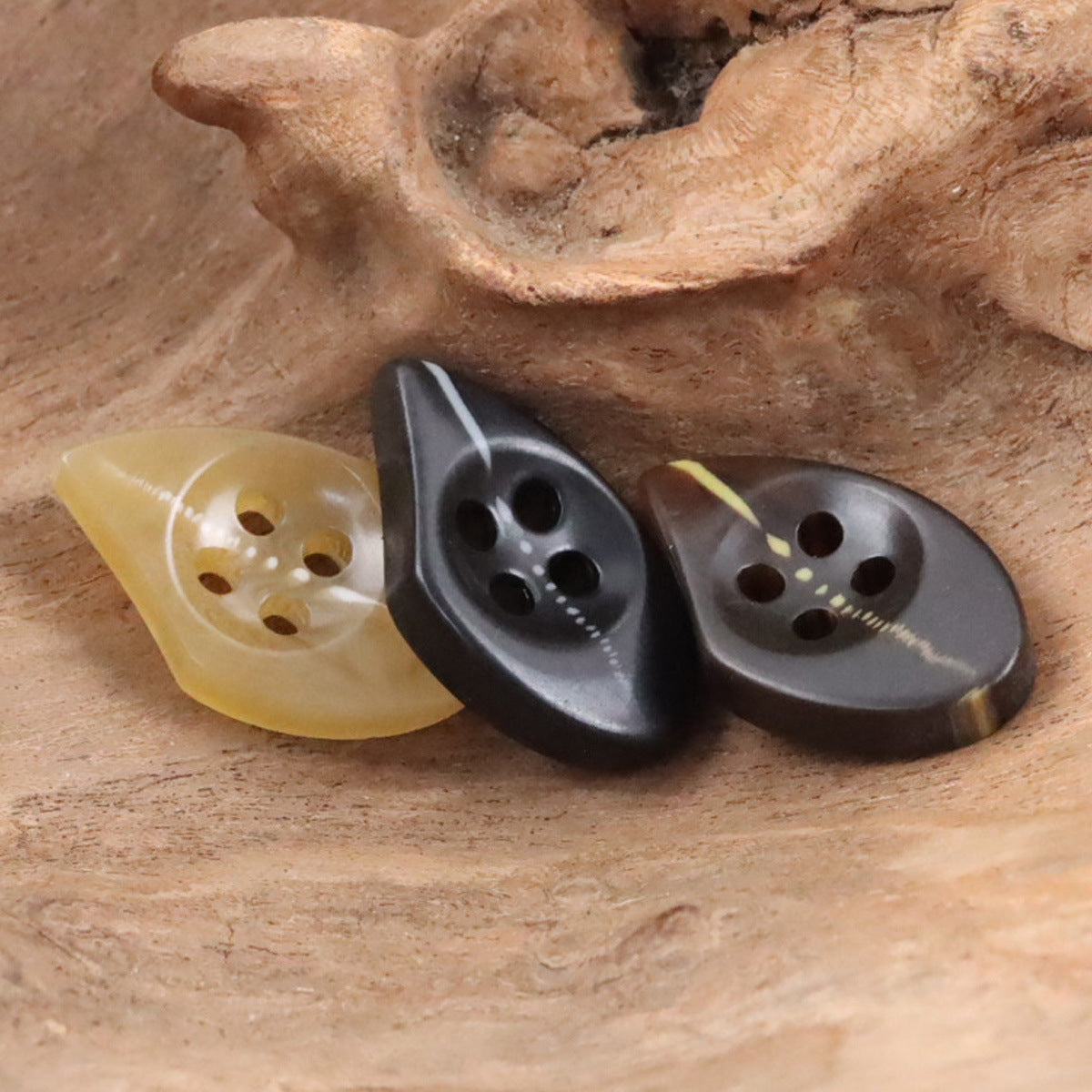 Irregular resin drop buttons in coffee and black, 4-hole each