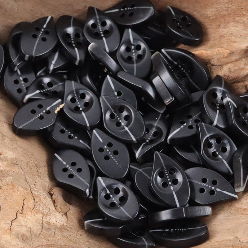 Black resin drop-shaped buttons, glossy, 4-hole design, set of pieces