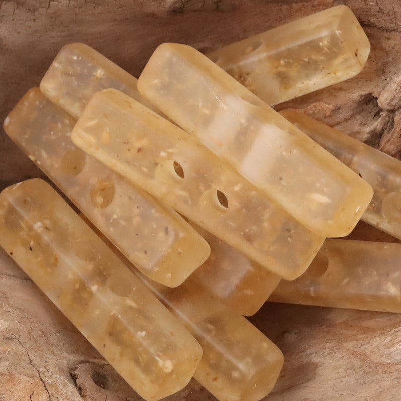 Two-hole long resin buttons, wood chip pattern, warm beige and honey tones