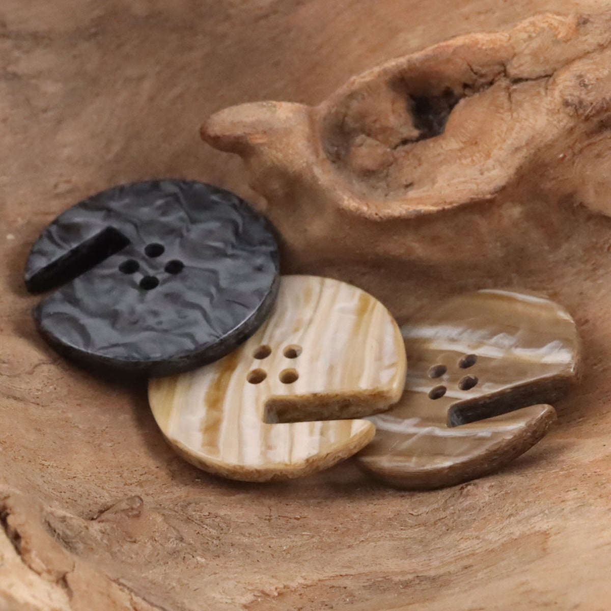 Wood-grain resin buttons with side cut-out and multi-hole openings, dark and light