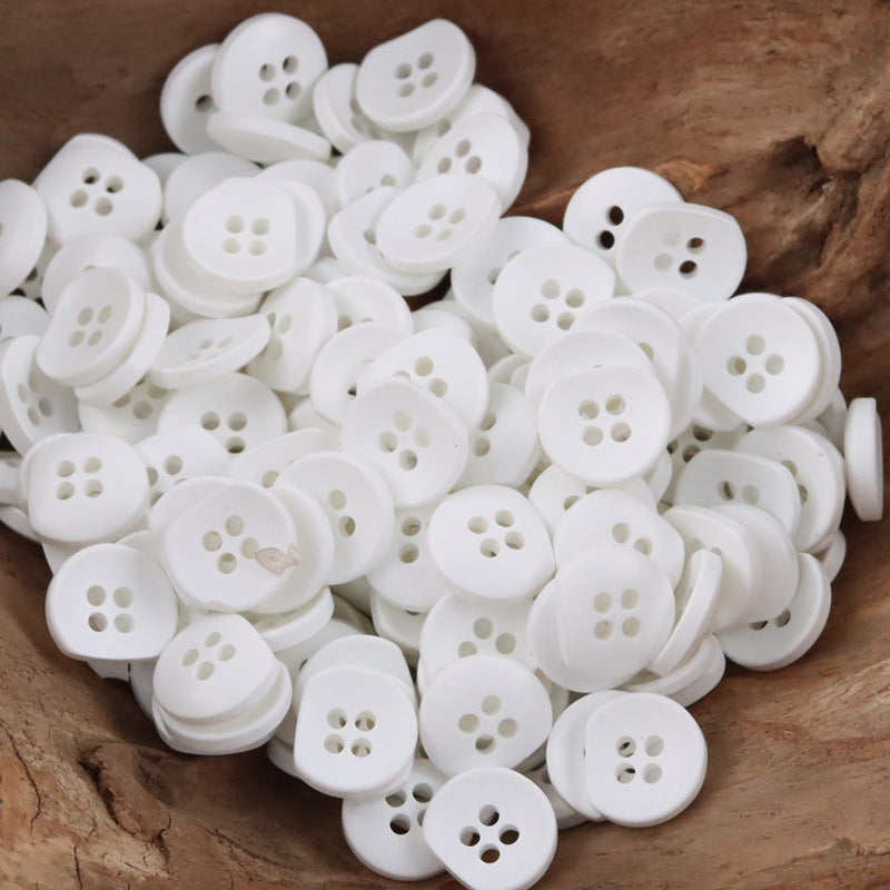 White round resin buttons with four holes, assorted bulk set for crafts and sewing