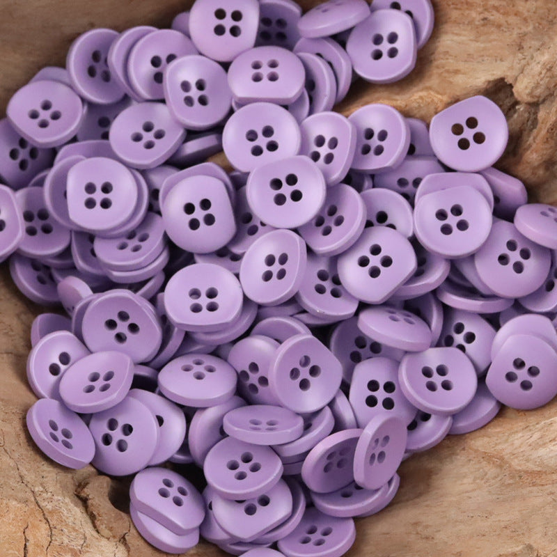 Bulk lavender/purple semi-circular resin buttons with four holes