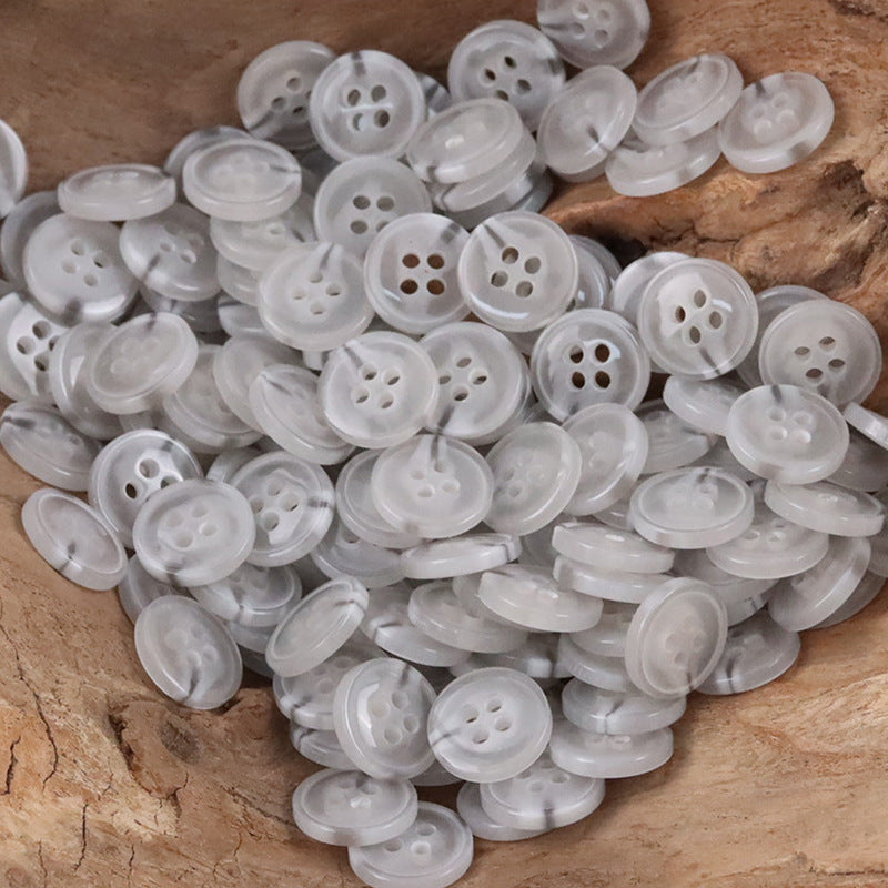 Assorted semi-transparent resin shirt buttons, translucent white, four-hole assortment
