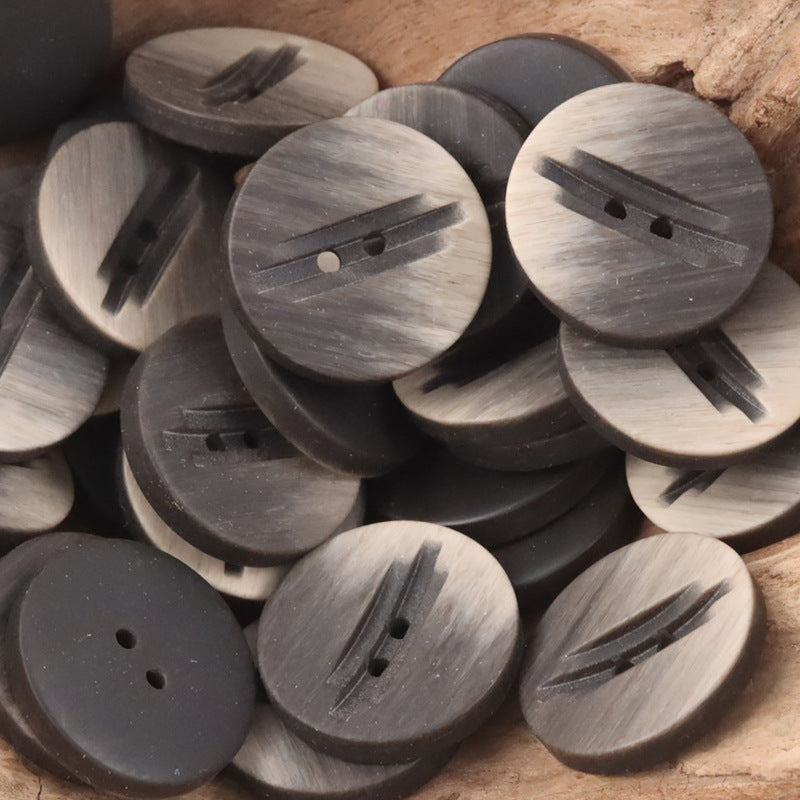 Assorted dark and light gray 2-hole resin buttons, wood-grain finish