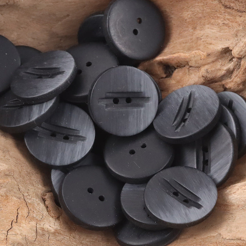 Dark 2-hole resin buttons, wood-grain finish, rounded backs