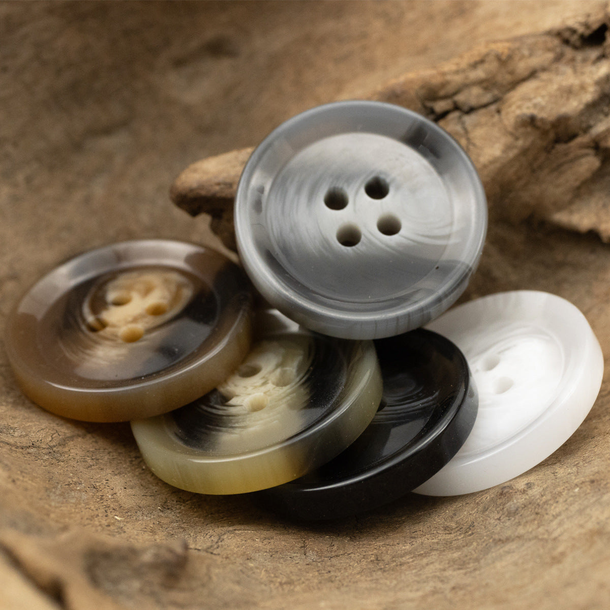 Gray marbled brush-pattern resin 4-hole button, round