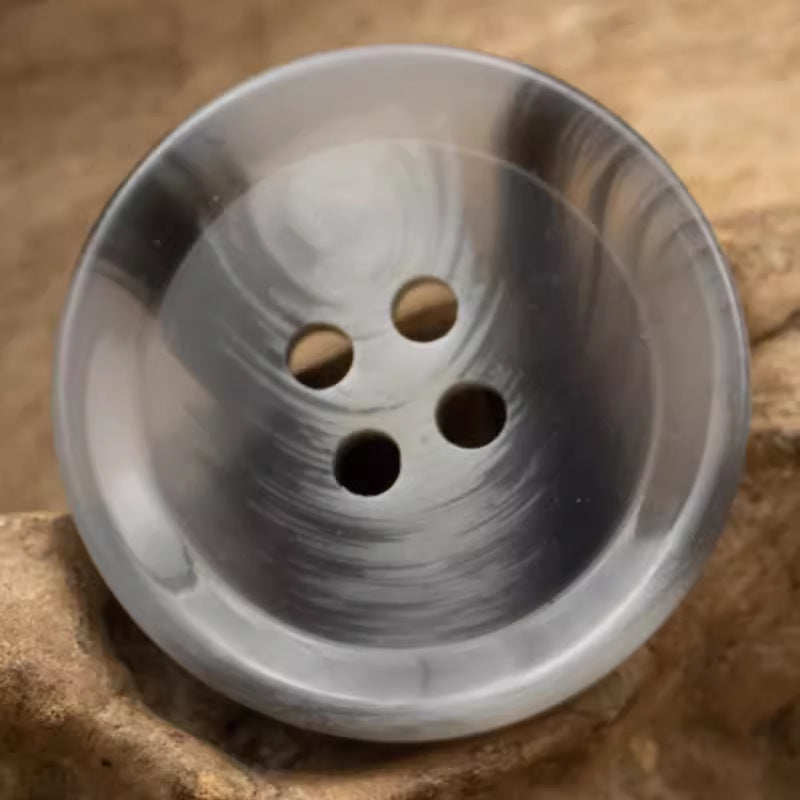 Gray resin 4-hole button, round with marbled brush-stroke pattern
