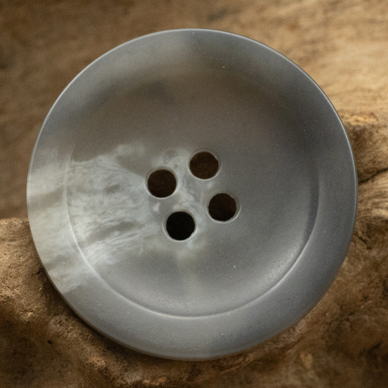 Wide-edged 4-hole urethane button, light gray, round bowl shape