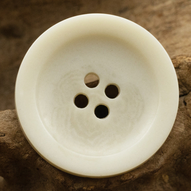 Wide-edged 4-hole urethane button, cream/off-white, round bowl shape