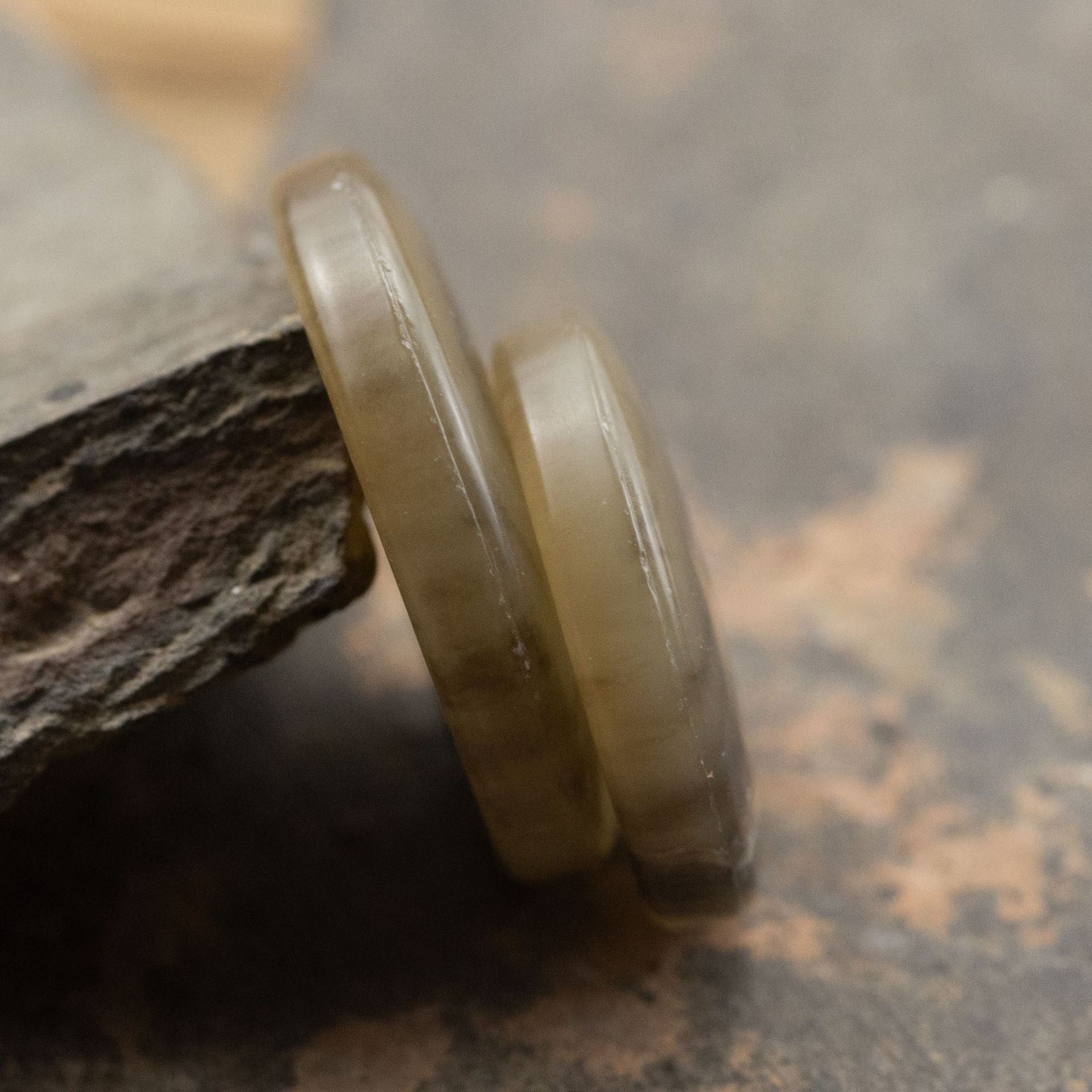 Coffee round urea button side view, slim rim and translucent edge
