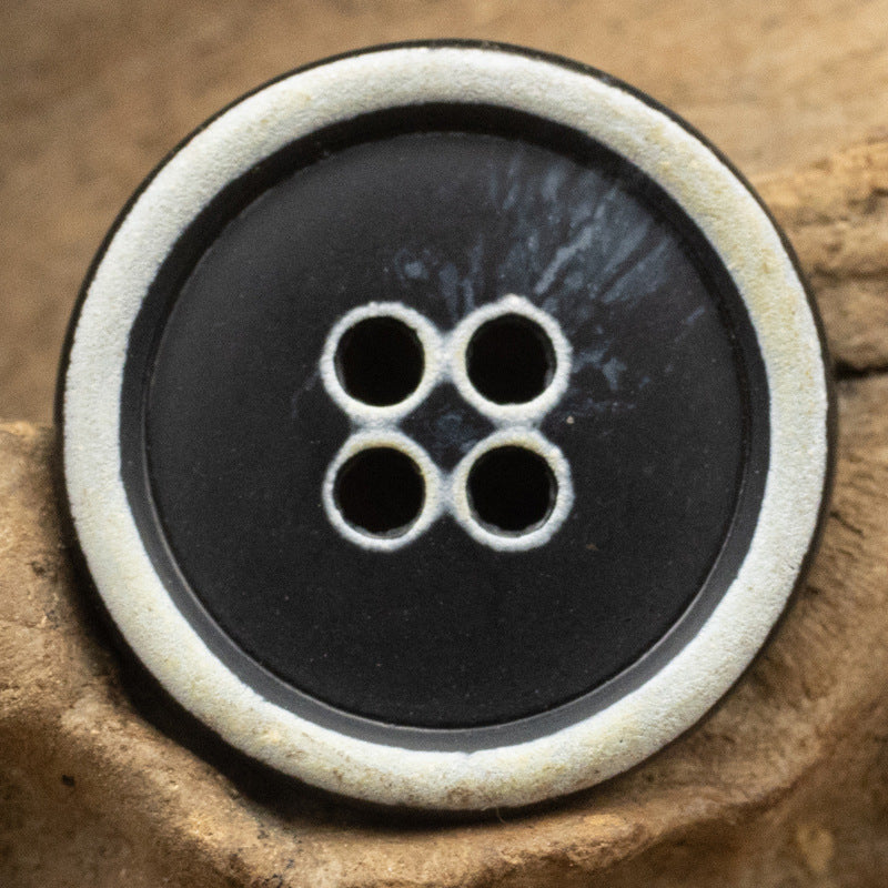 Round 4-hole imitation horn buttons, deep dark gray with white rim and horn-like pattern