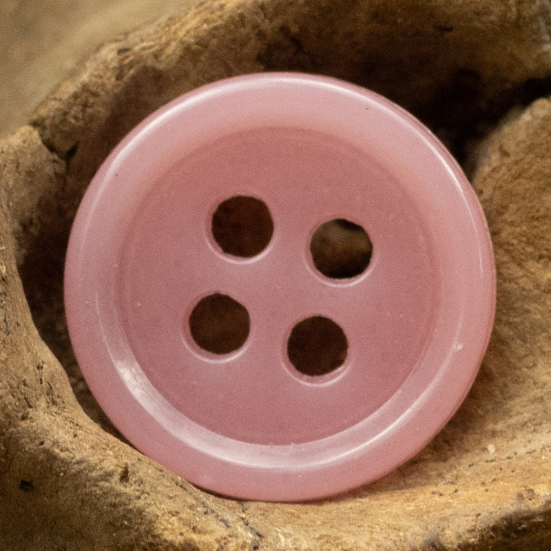 Pink 4-hole round urea resin button