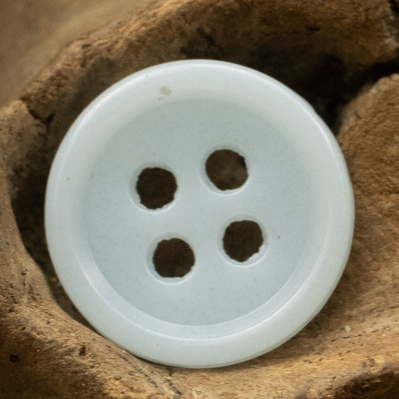 White 4-hole round urea resin button