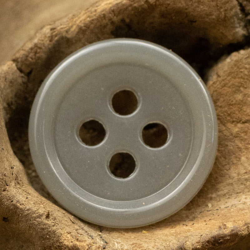 Gray 4-hole round urea resin button