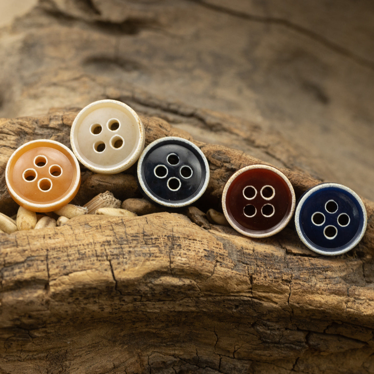 4-hole round button set in cream, orange, black, navy and brown tones
