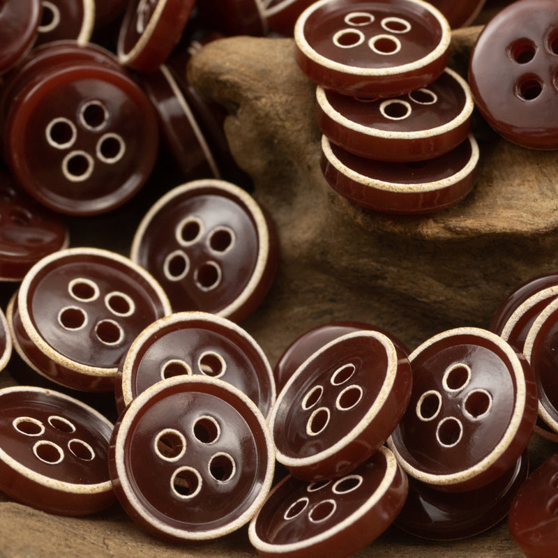 Dark brown 4-hole round buttons with lighter rim detail, assorted pieces