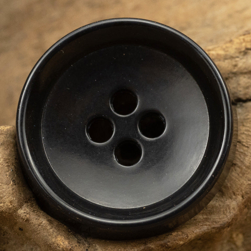Schwarze runde 4-Loch Urea-Knöpfe mit 4 Ösen, 15–25 mm