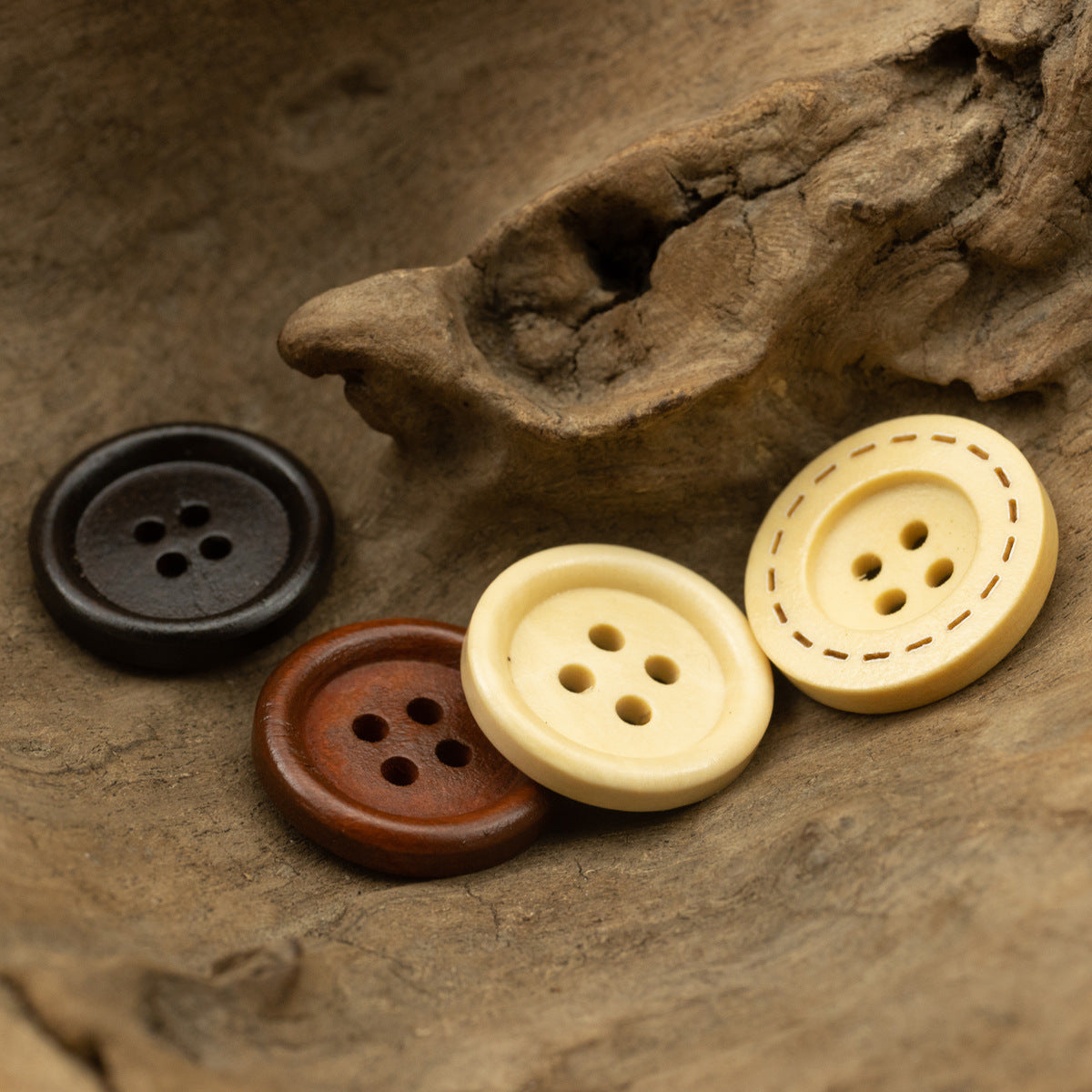 4-hole wooden buttons: black, brown, light yellow, and yellow-lined style (4 shown)