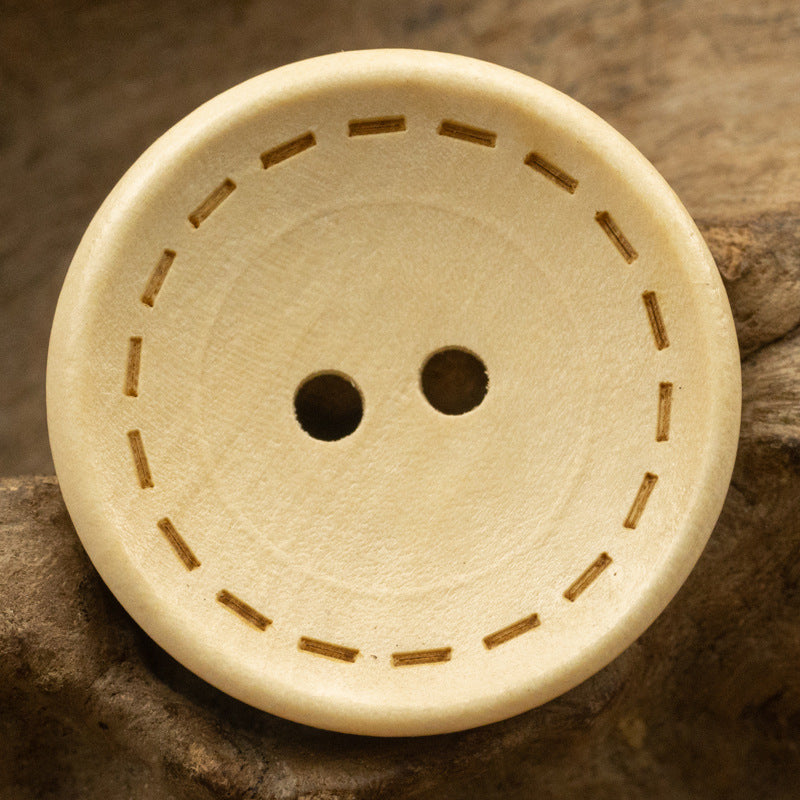 Two-hole dotted wood button, natural light wood tone, dotted stitch ring around rim
