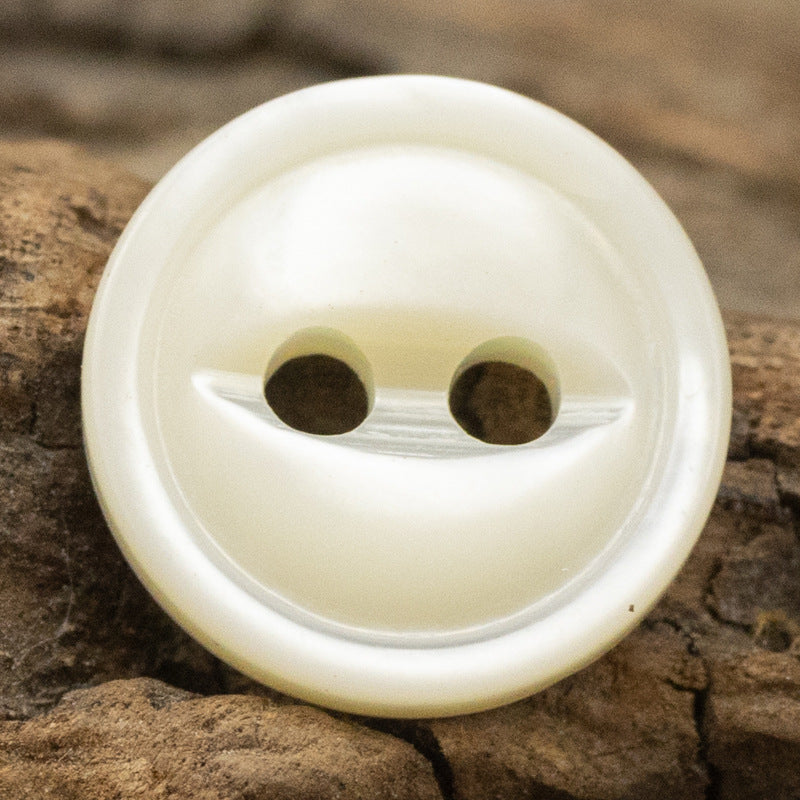 Beige pearl shell button, fish-eye 2-hole design, smooth iridescent surface