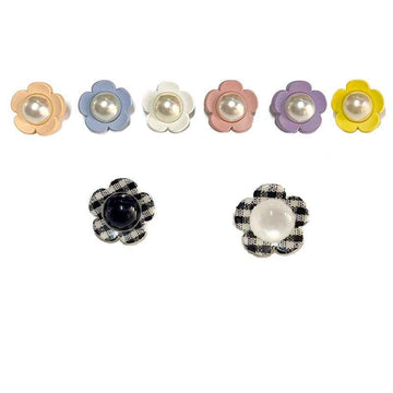 Pastel flower shank buttons with pearl centers: yellow, purple, pink, blue, cream.