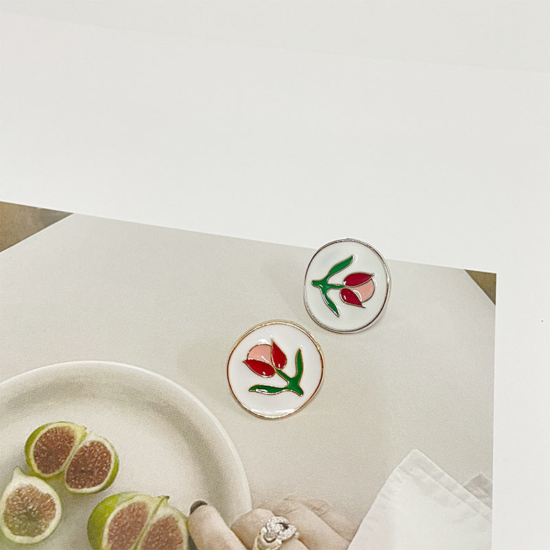 Two 18mm metal sewing buttons with tulip enamel pattern