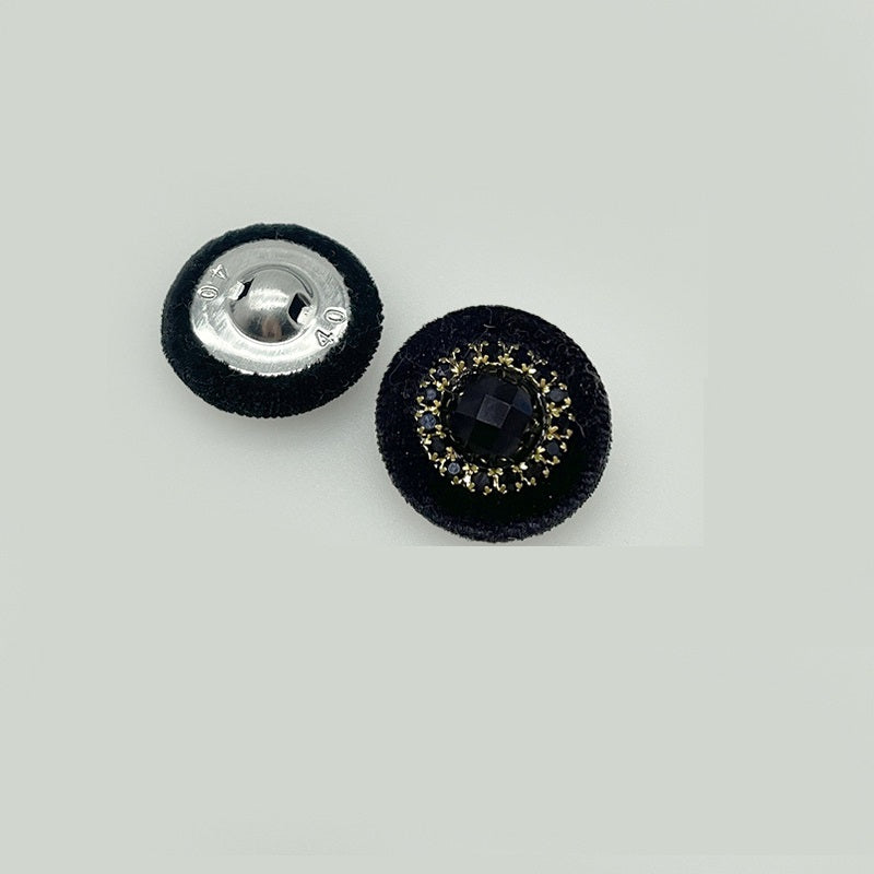 25mm black velvet button with gold-tone diamond trim and dark center gem