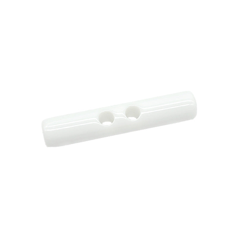 White long cylindrical resin toggle button, two front holes