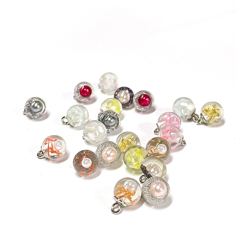 Assorted 10mm round pearl-style buttons with gold foil accents, metal loop backs