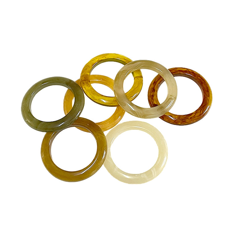 Resin ring buttons 25–50mm inner diameter, mixed yellow, olive green, cream, amber rings