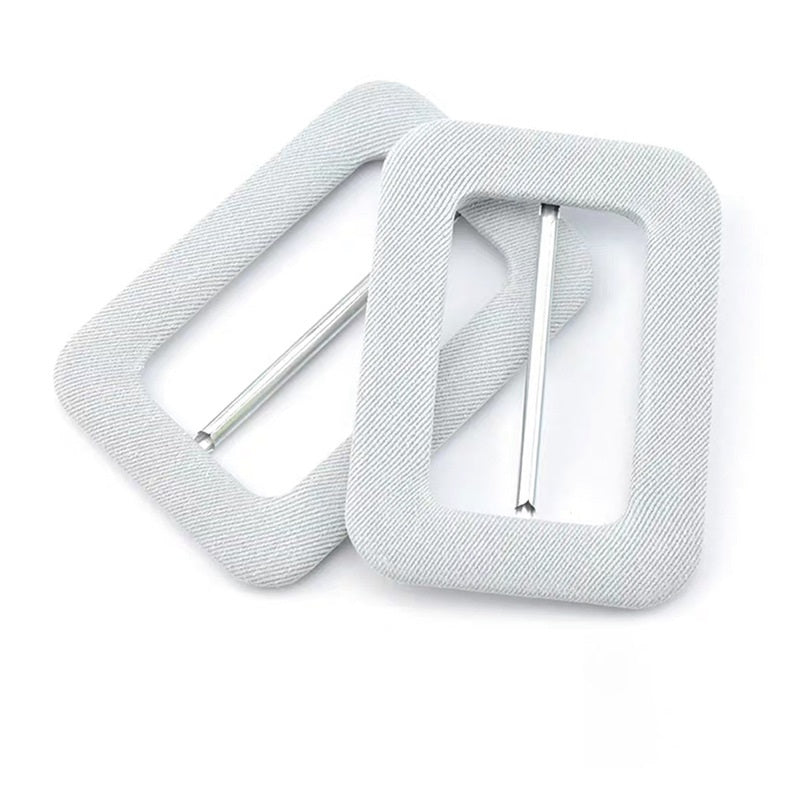 Light gray fabric D-ring buckle with metal bar and pin-style connector