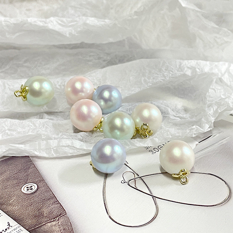 Pearl metal-base buttons with gold shanks in white, pink, blue and green