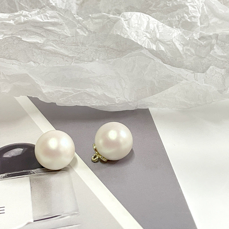 Pearl metal-base buttons, white round with gold shank loops (2-pack view)