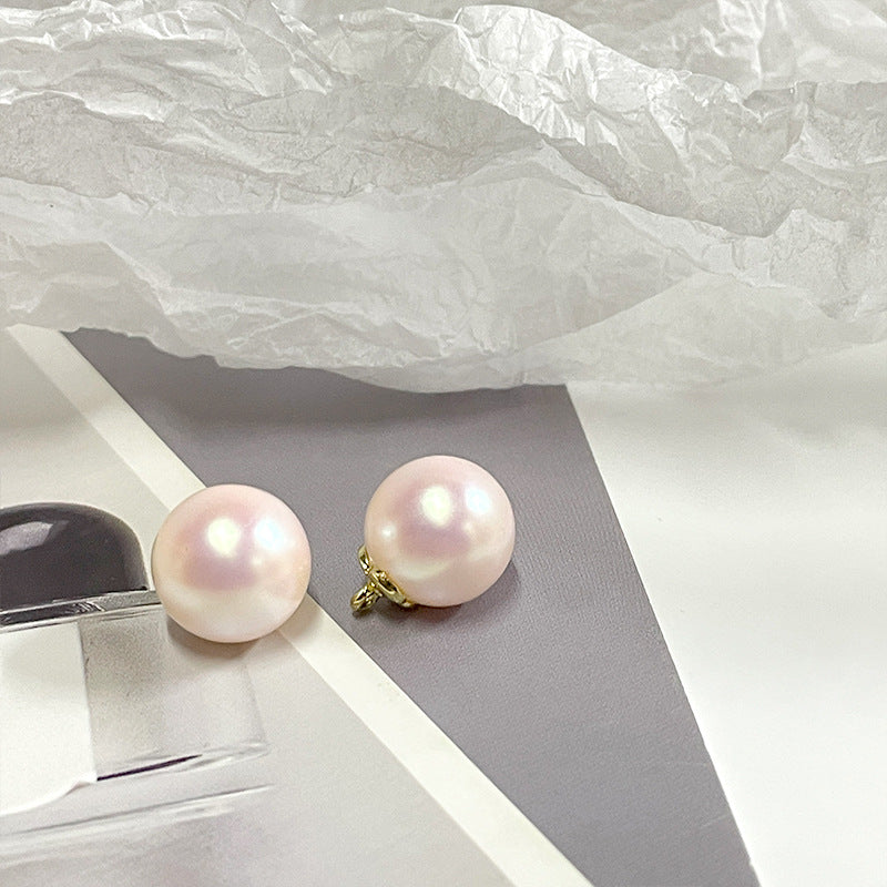 Pearl metal-base buttons, pink iridescent round with gold shank loops (2-pack view)