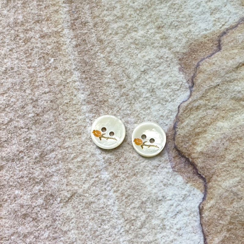 11.5mm 2-hole shell buttons with yellow rose pattern, pair