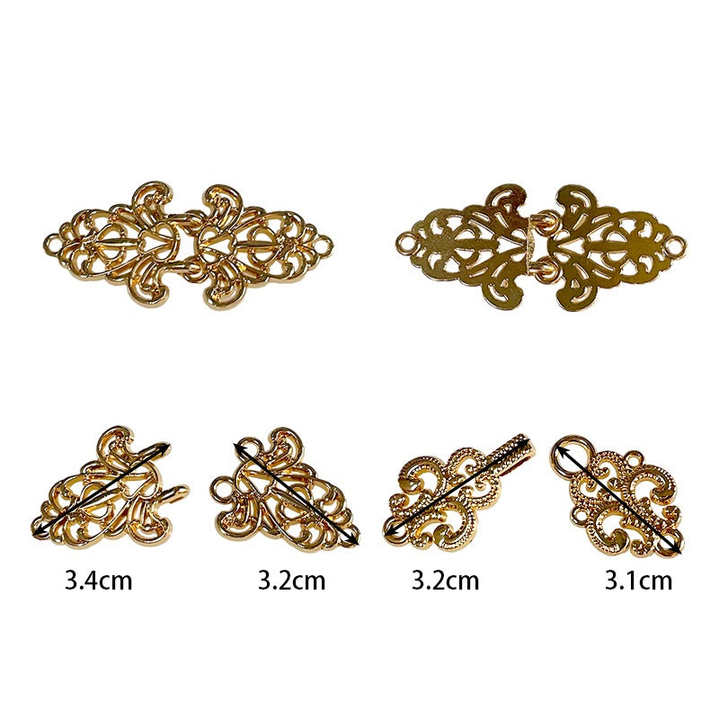 Ornate metal frog buttons, gold-tone filigree scroll toggle with decorative ring details