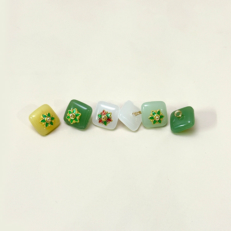 Square glass buttons with flower base: dark green, light yellow, clear
