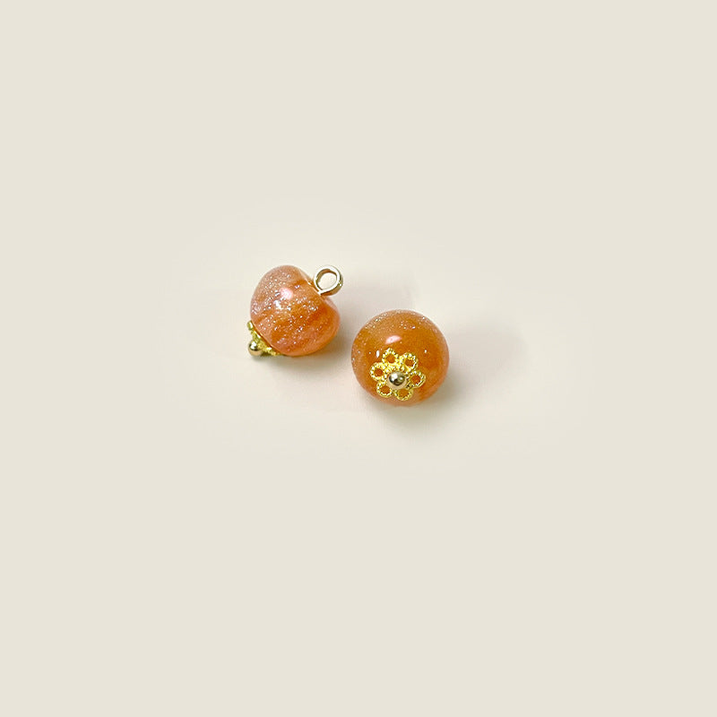 Orange 10mm Chinese-style glazed buttons with metal shanks, gold flower accents
