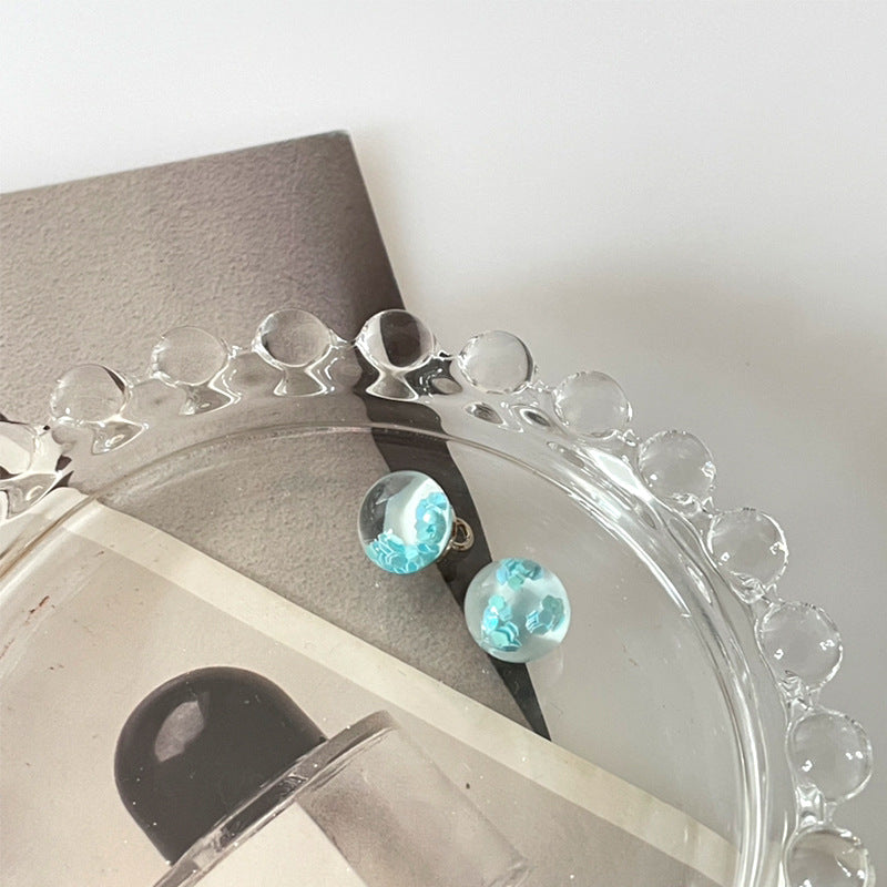 10mm transparent sequin bead buttons with blue translucent centers and round loop