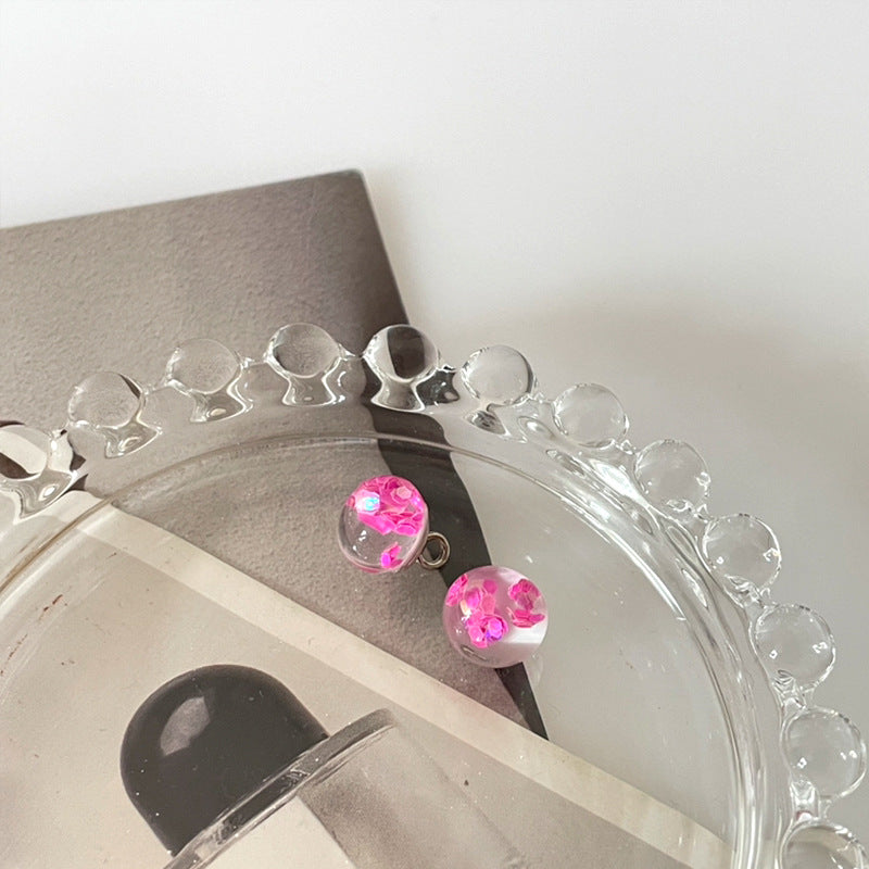 10mm transparent sequin bead buttons with pink translucent centers and round loop