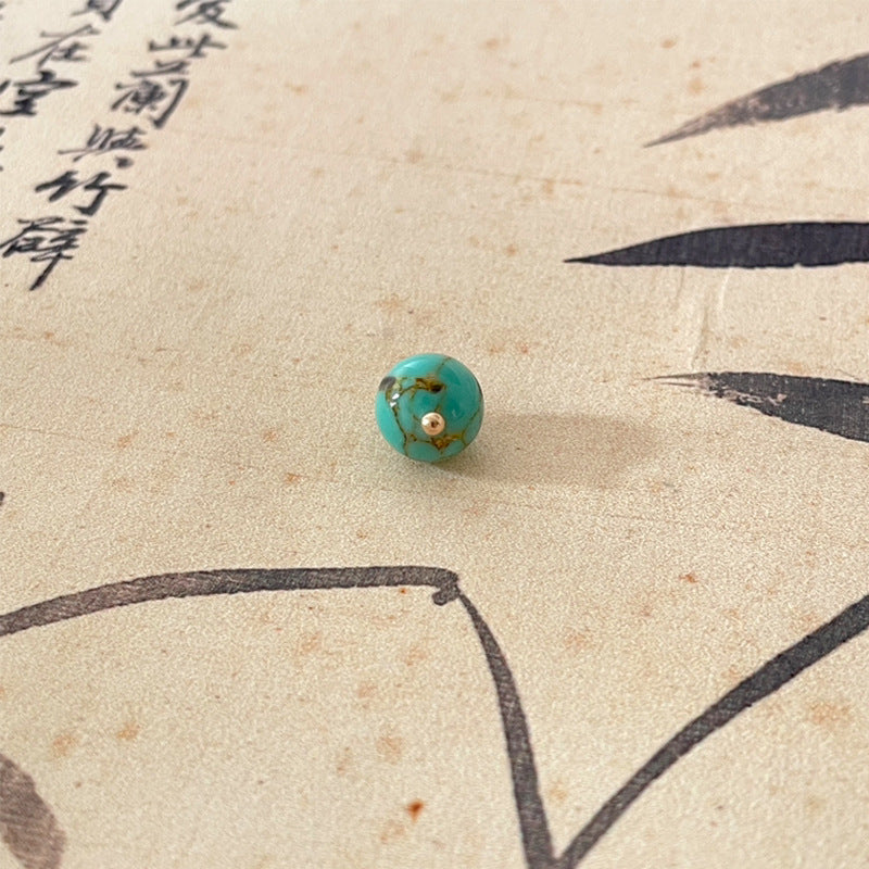 Teal turquoise jade-style round button with gold-tone shank, Chinese knot style