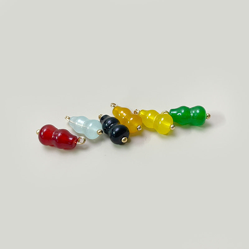 Mixed set of gourd-shaped glass buttons: red, light blue, black, yellow, green, gold loops