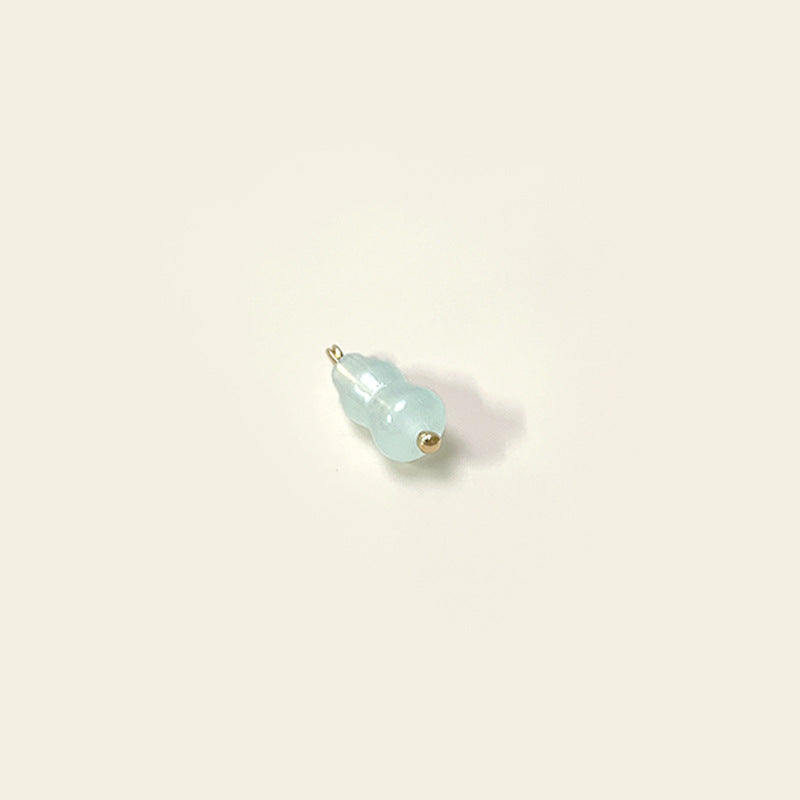 Light blue gourd-shaped glass button, 8x19mm, gold loop shank
