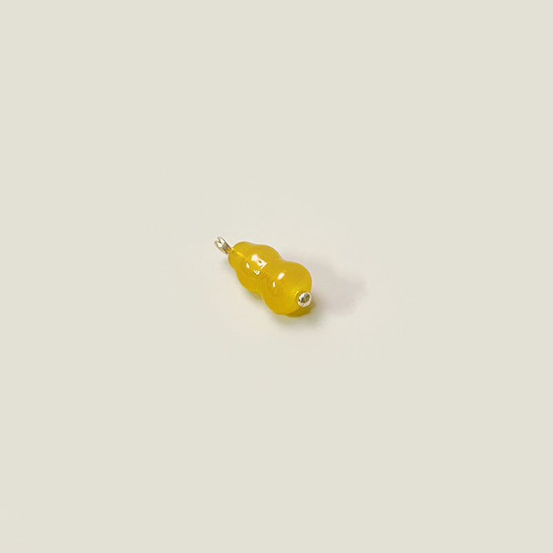 Yellow gourd-shaped glass button, 8x19mm, gold loop shank