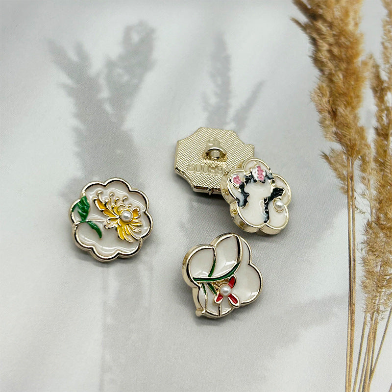 Vintage metal buttons with flower patterns and octagon backing, 15mm, close-up