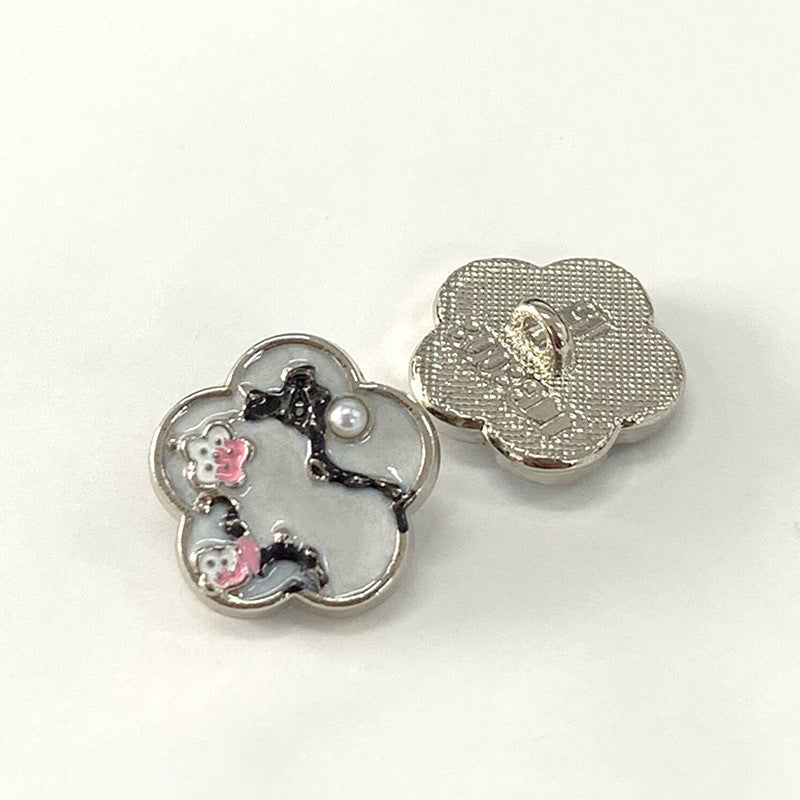 15mm vintage metal button with bird-and-flower motif, pink accents, gold-tone back